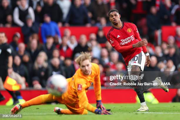 Marcus Rashford of Manchester United has a shot during the Emirates FA Cup Quarter Final fixture between Manchester United and Liverpool at Old...