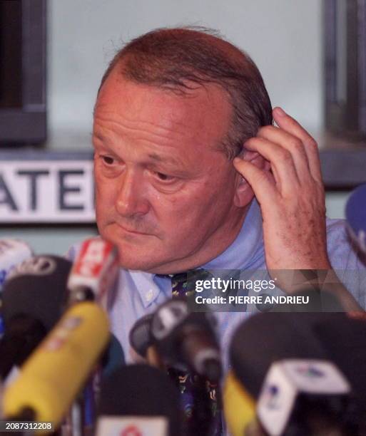 Tour de France's director Jean-Marie Leblanc seems worried as he speaks to the press after the 12th stage in Cap d'Agde, southern France, 24 July as...