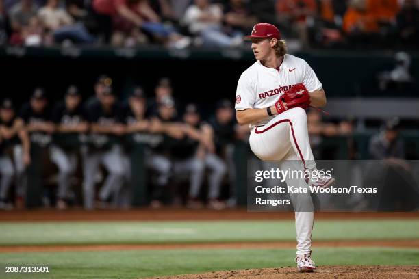 Hagen Smith of the Arkansas Razorbacks pitches during a game against the Oregon State Beavers at the Kubota College Baseball Series at Globe Life...