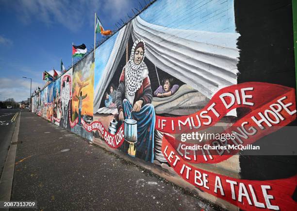 Palestinian solidarity murals can be seen on the International Wall on the Falls Road on March 18, 2024 in Belfast, Northern Ireland. The...