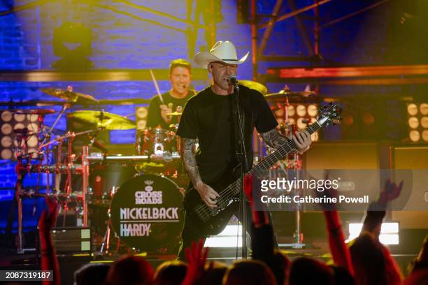 Mike Kroeger of Nickelbacks perform at CMT Crossroads: Nickelback & HARDY at Marathon Music Works on March 07, 2024 in Nashville, Tennessee.