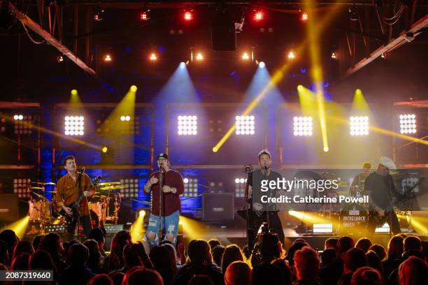 Ryan Peake of Nickelback, HARDY, and Chad Kroeger, Daniel Adair and Mike Kroeger of Nickelback perform at CMT Crossroads: Nickelback & HARDY at...