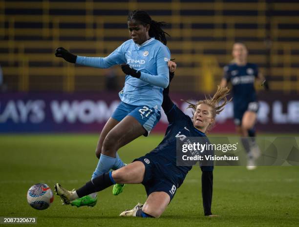 Khadija Shaw of Manchester City is challenged by Sjoeke Nuesken of Chelsea during the FA Women's Continental Tyres League Cup Semi Final match...