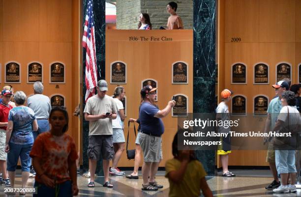 Fans in the rotunda of the plaque gallery at the National Baseball Hall of Fame and Museum in Cooperstown, NY, Tuesday June 25, 2013.