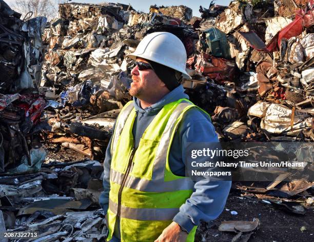 Operations manager Ron Hamilton before piles of crushed and bailed up cars of Ben Weitsman of Albany's scrapyard at the Port of Albany Thursday Jan....