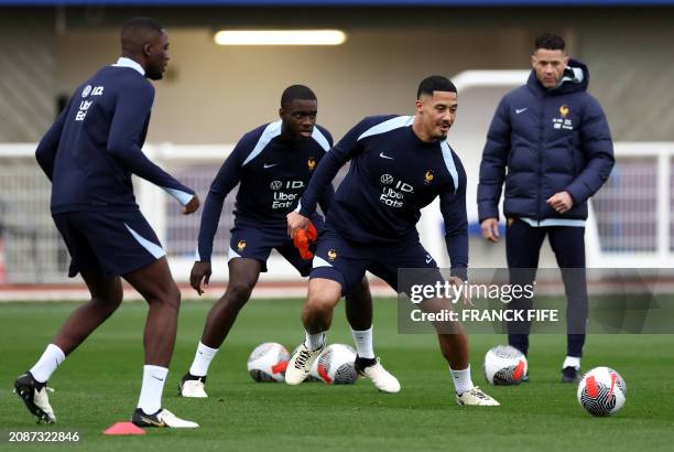 France's defender WIlliam Saliba takes part in a training session as part of the team's preparation for the upcoming friendly football matches...