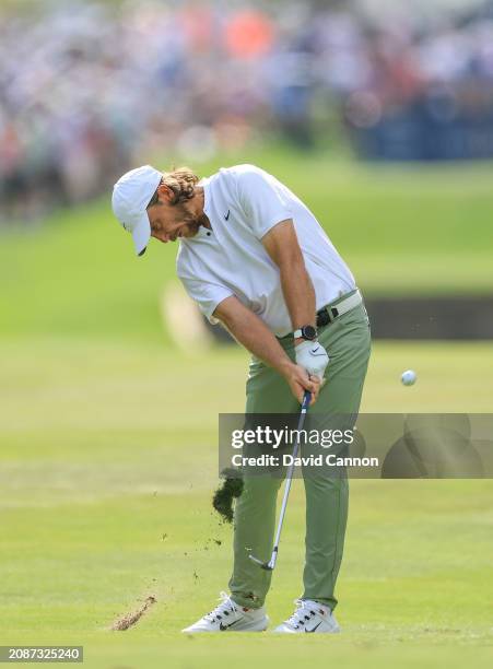 Tommy Fleetwood of England plays his second shot on the 10th hole during the second round of THE PLAYERS Championship on the Stadium Course at TPC...