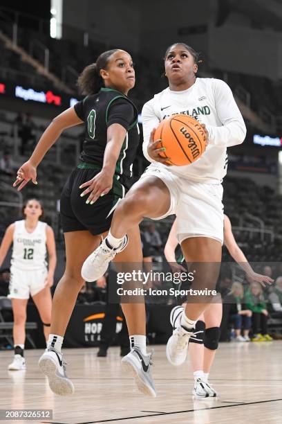 Cleveland State Vikings Guard Colbi Maples shoots as Wright State Raiders Forward Jada Tate defends during the Horizon League Championship semi-final...