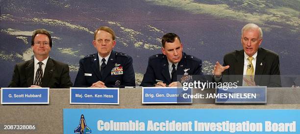 The Columbia Accident Investigation Board Chairman retired Navy Admiral Harold W. Gehman and board members conduct a press conference at Johnson...