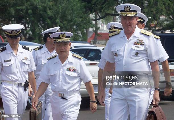 Rear Adm. Paul F. Sullivan, Director for plans and policy US Strategic Command, and Read Adm. Isamu Ozawa of the Japan Maritime Self Defense Force...