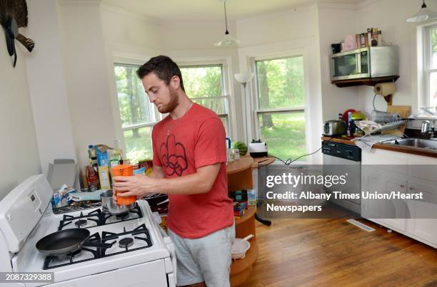 Ant Hill's head of partnershi[s Ethan Glass makes coffee in the kitchen of their Hacker House, where young entrepreneurs live and work Thursday July...