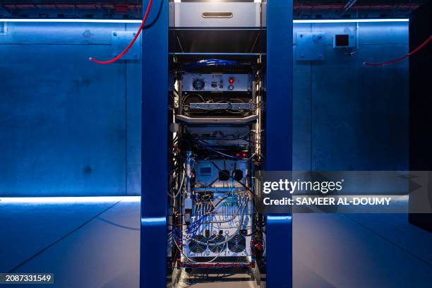 This photograph taken on March 18, 2024 shows a view of MosaiQ modular Quantum Computer during its inauguration at the factory of OVHcloud in Croix,...