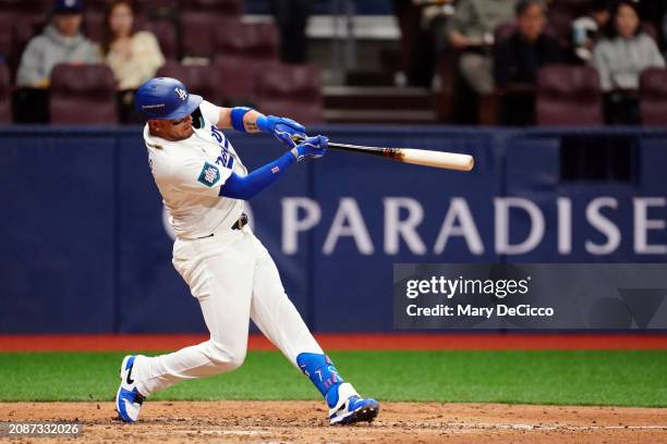 Miguel Rojas of the Los Angeles Dodgers bats during the 2024 Seoul Series game between the Los Angeles Dodgers and the Kiwoom Heroes at Gocheok Sky...