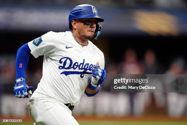 Miguel Rojas of the Los Angeles Dodgers singles in the eighth inning during the 2024 Seoul Series game between the Los Angeles Dodgers and the Kiwoom...