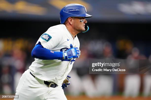 Miguel Rojas of the Los Angeles Dodgers singles in the seventh inning during the 2024 Seoul Series game between the Los Angeles Dodgers and the...