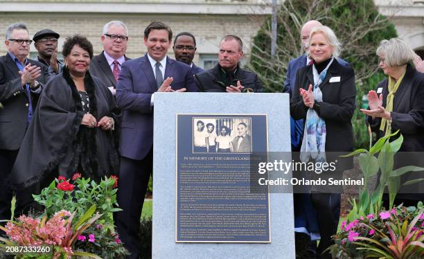 Florida Gov. Ron DeSantis, center left; Lake County Sheriff Peyton C. Grinnell, center; State Representative Geraldine Thompson, third from left, and...