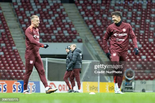 Kamil Grosicki and Robert Lewandowski are training with Team Poland before the Euro 2024 play-off match against Estonia in Warsaw, Poland, on March...