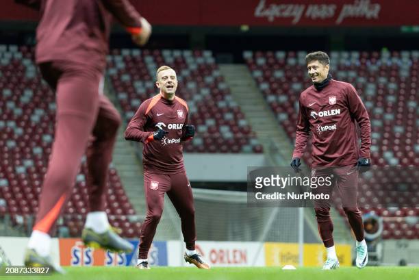 Kamil Grosicki and Robert Lewandowski are training with Team Poland before the Euro 2024 play-off match against Estonia in Warsaw, Poland, on March...