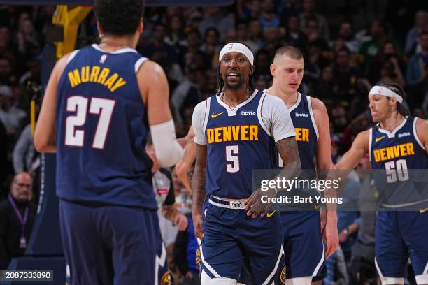 Kentavious Caldwell-Pope of the Denver Nuggets looks on during the game against the Toronto Raptors on March 11, 2024 at the Ball Arena in Denver,...