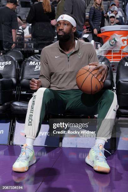 Patrick Beverley of the Milwaukee Bucks warms up form the bench prior to the game against the Sacramento Kings on March 12, 2024 at Golden 1 Center...