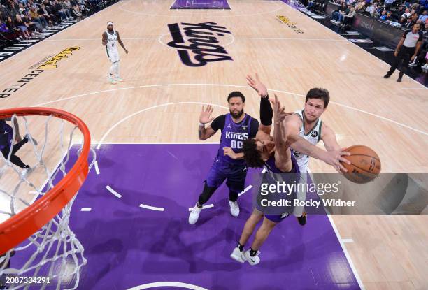 Danilo Gallinari of the Milwaukee Bucks drives to the basket during the game against the Sacramento Kings on March 12, 2024 at Golden 1 Center in...