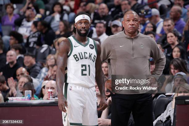 Patrick Beverley and Head Coach Doc Rivers of the Milwaukee Bucks look on during the game against the Sacramento Kings on March 12, 2024 at Golden 1...