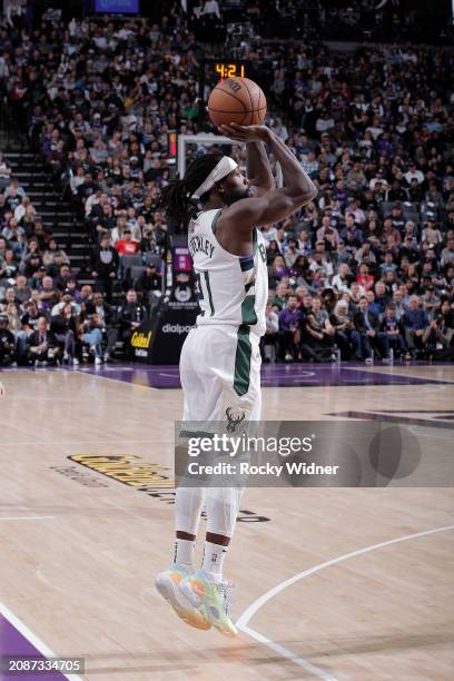 Patrick Beverley of the Milwaukee Bucks shoots a three pointer during the game against the Sacramento Kings on March 12, 2024 at Golden 1 Center in...