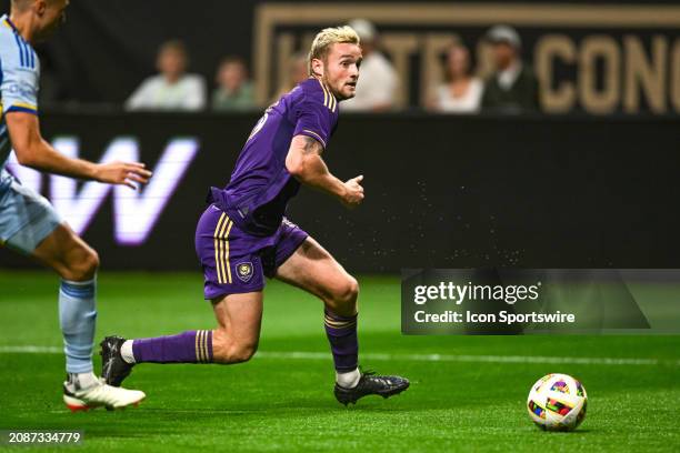 Orlando forward Duncan McGuire moves with the ball during the MLS match between Orlando City SC and Atlanta United FC on March 17th, 2024 at...