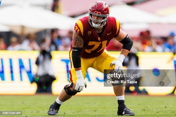 Michael Tarquin of the USC Trojans in an offensive stance during a game against the UCLA Bruins at United Airlines Field at the Los Angeles Memorial...