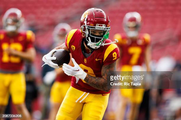 Michael Jackson III of the USC Trojans runs after the catch during a game against the UCLA Bruins at United Airlines Field at the Los Angeles...