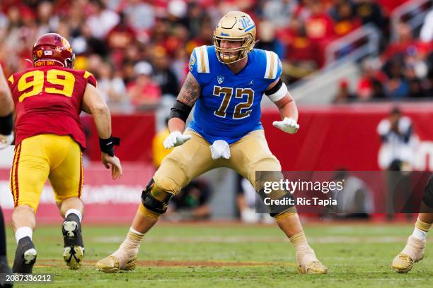 Garrett DiGiorgio of the UCLA Bruins blocks during a game against the USC Trojans at United Airlines Field at the Los Angeles Memorial Coliseum on...