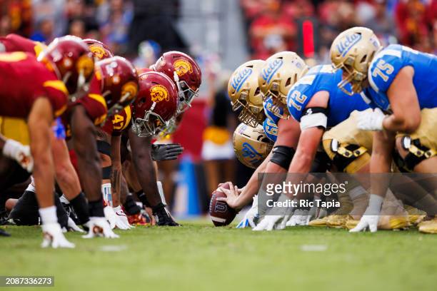 Trojans defense and UCLA Bruins offense at the line of scrimmage before an extra point attempt during a game at United Airlines Field at the Los...