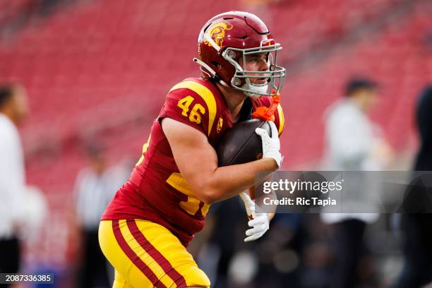 Corey Nerhus of the USC Trojans runs after the catch during a game against the UCLA Bruins at United Airlines Field at the Los Angeles Memorial...