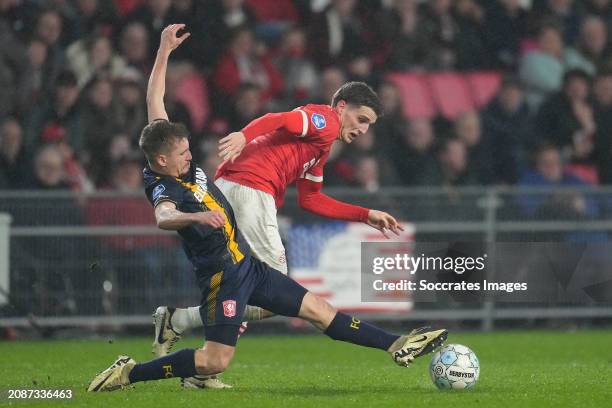 Michal Sadilek of FC Twente, Guus Til of PSV during the Dutch Eredivisie match between PSV v Fc Twente at the Philips Stadium on March 17, 2024 in...