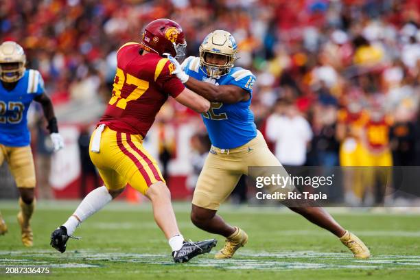 Grayson Murphy of the UCLA Bruins rushes the edge during a game against the USC Trojans at United Airlines Field at the Los Angeles Memorial Coliseum...