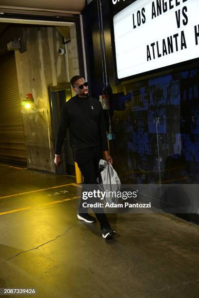 Assistant Coach Ekpe Udoh of the Atlanta Hawks arrives to the arena before the game on March 18, 2024 at Crypto.Com Arena in Los Angeles, California....