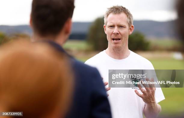 Jack Riewoldt speaks with media during the Tasmania Devils Media Opportunity at Campbell Town Football Club on March 19, 2024 in Campbell Town,...