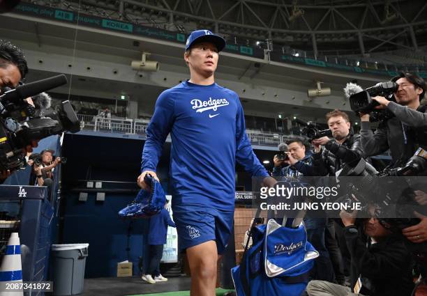 Los Angeles Dodgers' pitcher Yoshinobu Yamamoto attends a baseball workout at Gocheok Sky Dome in Seoul on March 19 ahead of the 2024 MLB Seoul...