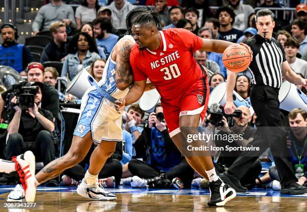 North Carolina State Wolfpack forward DJ Burns Jr. In action in the ACC Tournament Championship game between the North Carolina State Wolfpack and...