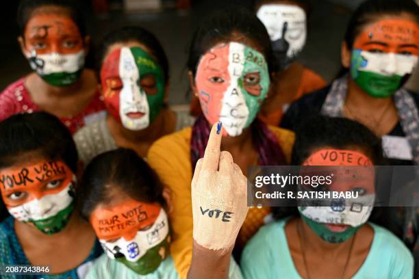 College students spread awareness for first generation voters during an election campaign ahead of India's upcoming national elections in Chennai on...