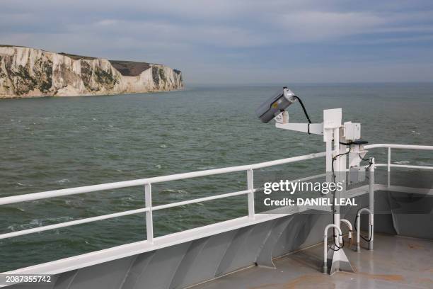 Photograph taken on March 14, 2024 shows a CCTV camera on the deck of the Hybrid Ferry ship P&O Liberte, docked in the port of Dover, southern...