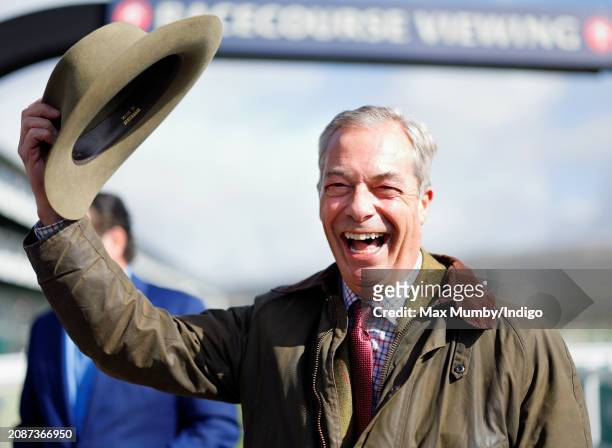 Nigel Farage attends day 4 'Gold Cup Day' of the Cheltenham Festival at Cheltenham Racecourse on March 15, 2024 in Cheltenham, England.