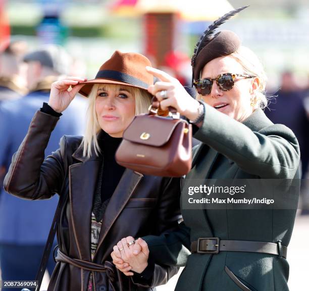 Katherine Kelly and Zara Tindall attend day 4 'Gold Cup Day' of the Cheltenham Festival at Cheltenham Racecourse on March 15, 2024 in Cheltenham,...