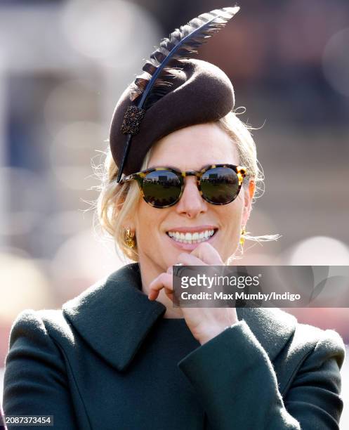 Zara Tindall watches the racing as she attends day 4 'Gold Cup Day' of the Cheltenham Festival at Cheltenham Racecourse on March 15, 2024 in...