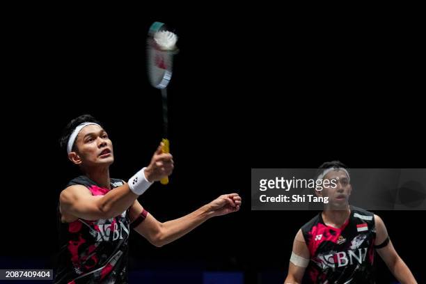 Fajar Alfian and Muhammad Rian Ardianto of Indonesia compete in the Men's Doubles Quarter Finals match against Lee Yang and Wang Chi-Lin of Chinese...
