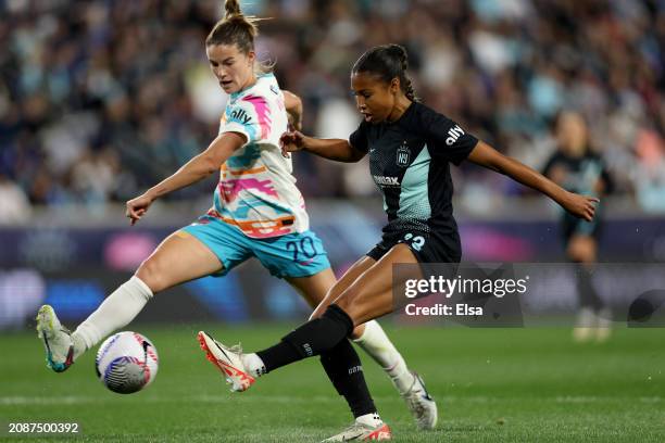 Margaret Purce of the NY/NJ Gotham FC heads for the net as Christen Westphal of the San Diego Wave FC defends during the first half of the 2024 NWSL...