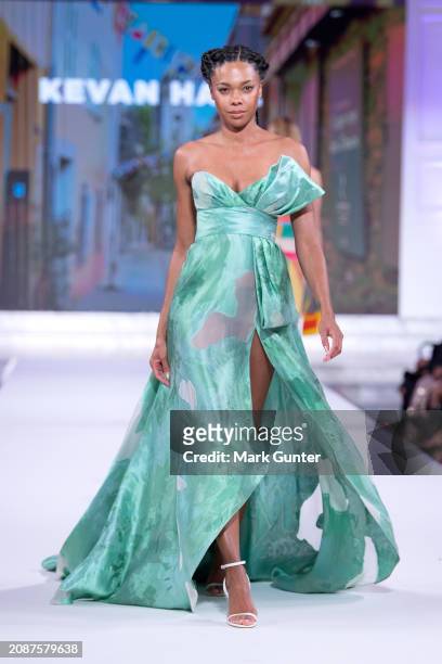Model walks the runway wearing Kevan Hall for the NAACP Fashion Show at Vibiana on March 15, 2024 in Los Angeles, California.