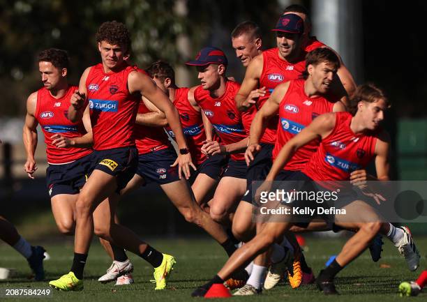 Demons player in action during a Melbourne Demons AFL training session at Gosch's Paddock on March 16, 2024 in Melbourne, Australia.