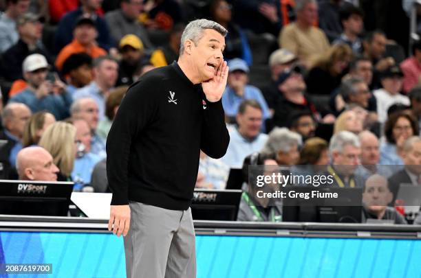 Head coach Tony Bennett of the Virginia Cavaliers calls out a play in the first half against the North Carolina State Wolfpack in the Semifinals of...