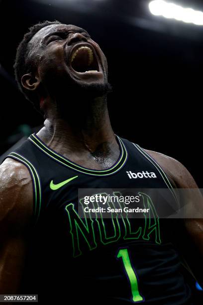 Zion Williamson of the New Orleans Pelicans reacts after scoring during the third quarter of an NBA game against the LA Clippers at Smoothie King...